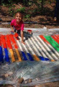 Even 'lil volunteers can paint a difference! She's sprucing up the Atlanta BeltLine. 